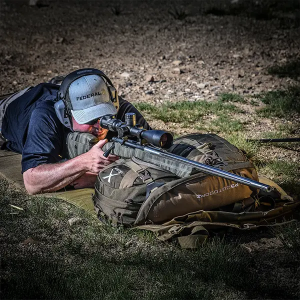 Man aiming a rifle